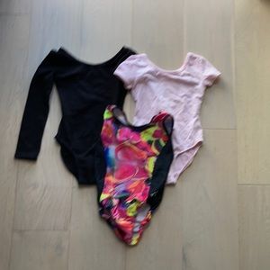 3 leotards - size 5-6. Perfect for ballet or gymnastics